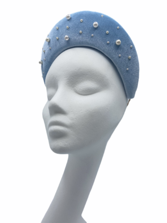 Baby blue velvet halo crown with pearl detail.