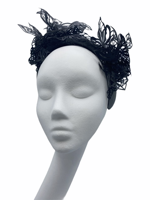 Charcoal velvet headband/crown with black laser cut embellished detail.
