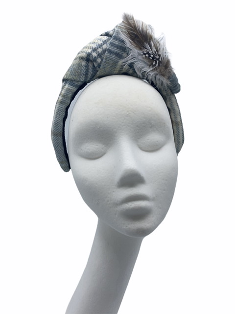 Grey tweed turban crown with feather detail to finish. Perfect for winter racing for those whom don't want to wear a headpiece.