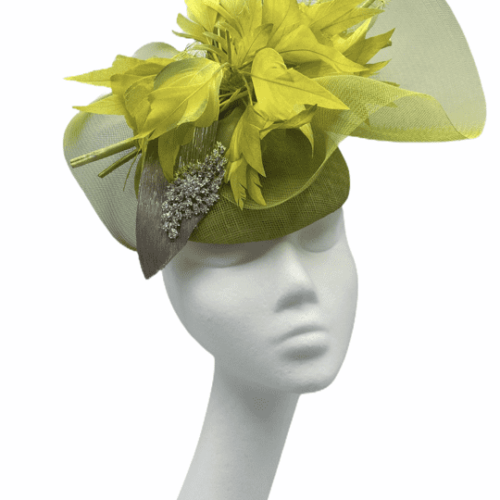 Lime green base with lime green crin and lime green flower detail, finished off on a taupe brown swirl underneath with a jewelled embellishment to finish.