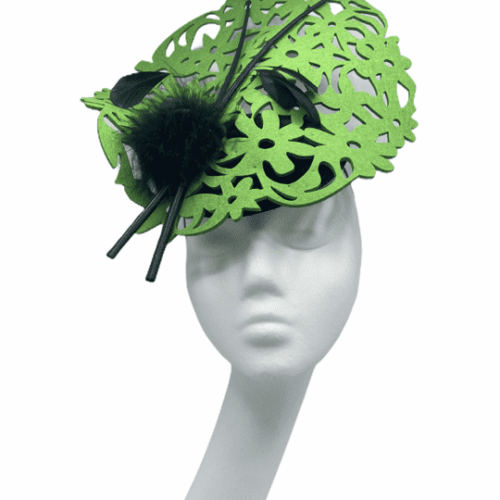 Black base headpiece with green laser cut detail with black pompom and black quills