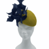 Mustard velvet small teardrop with navy swirl detail to the front.