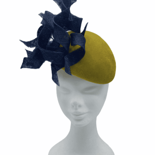 Mustard velvet small teardrop with navy swirl detail to the front.