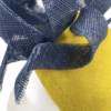 Mustard velvet small teardrop with navy swirl detail to the front.