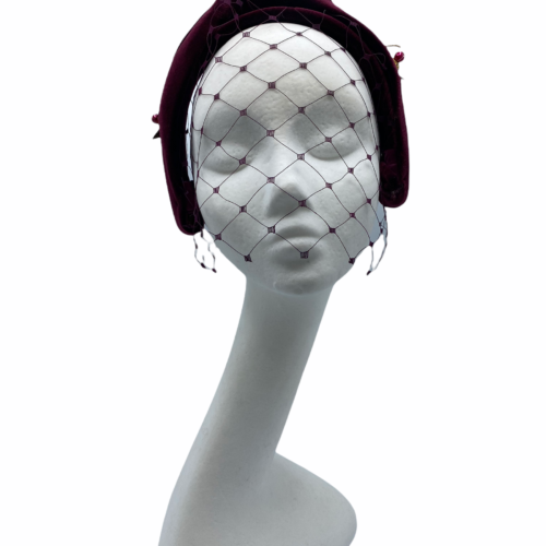 Burgundy veiled turban crown, with side bead detail.