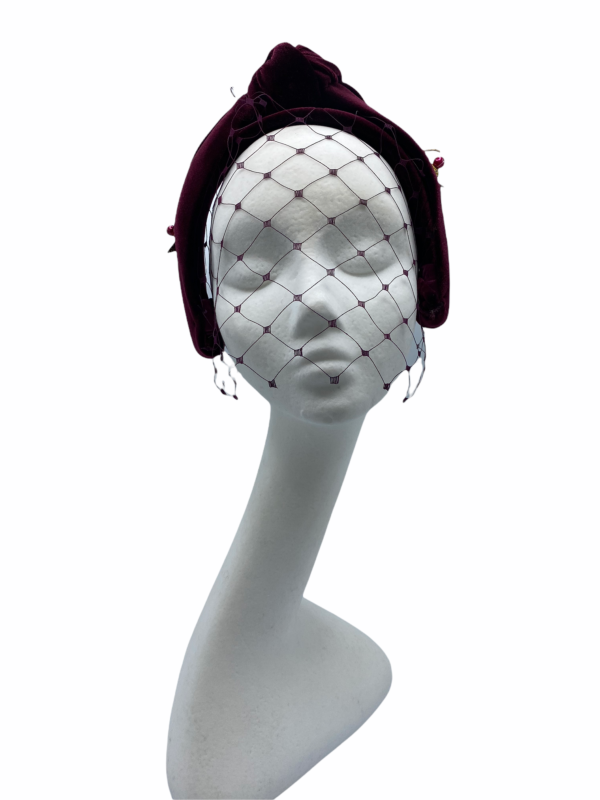 Burgundy veiled turban crown, with side bead detail.