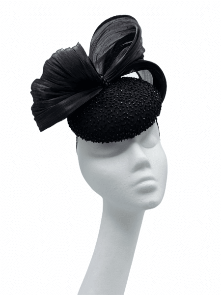Stunning black headpiece with hand beaded detail with the most beautiful silk abaca bow.