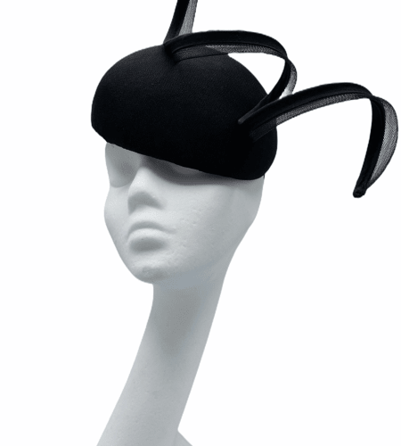 Black headpiece with black swirl detail to the top, very elegant.