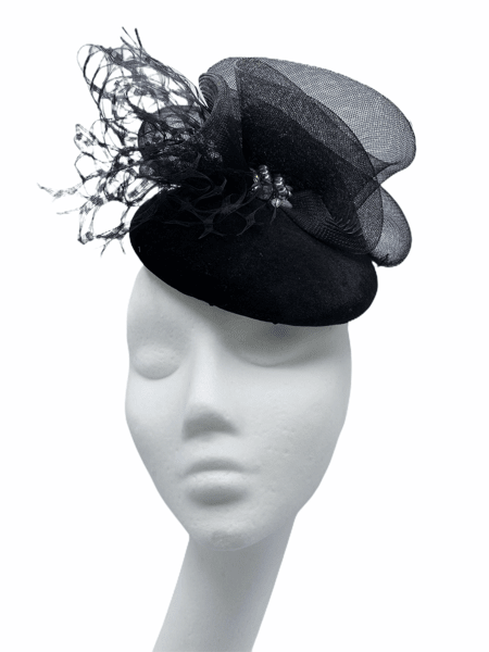 Black velvet hat with crin and net detail, black pearl inset.