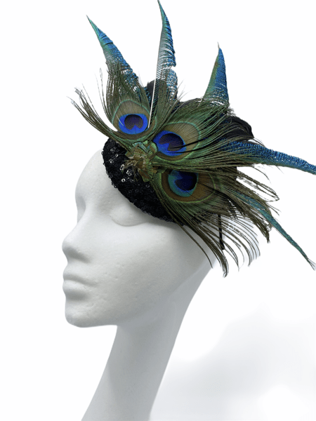 Black sequined base headband with peacock feather detail.