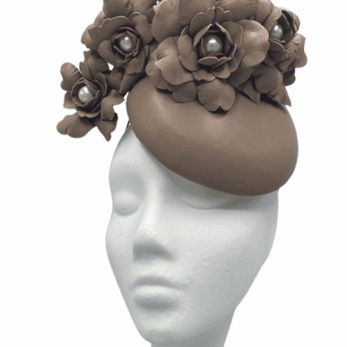 Nude leather pillbox headpiece with handmade leather flower with pearl centre detail.