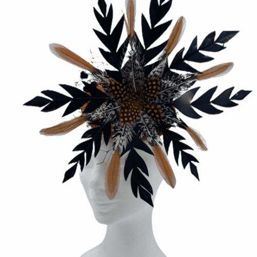 Orange base headpiece with structured circular formation in the colours of black and orange.