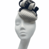 Cream/black satin headpiece with swirl detail. (small in size)