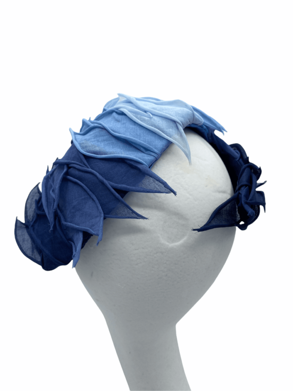 Stunning wide petalled navy and blue crown headpiece.