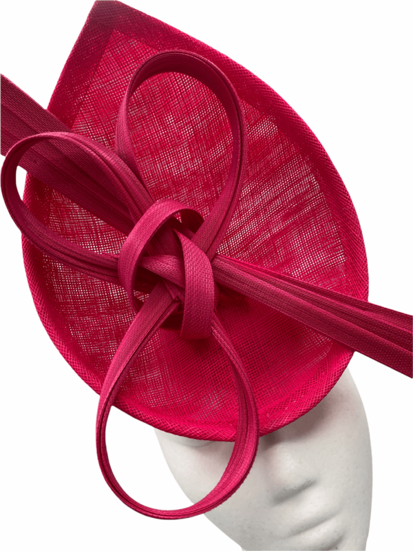 Pink structured centre percher headpiece. 