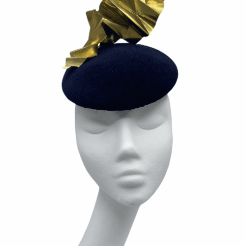 Navy felt base headpiece finished with a gold tin crinkle detail.