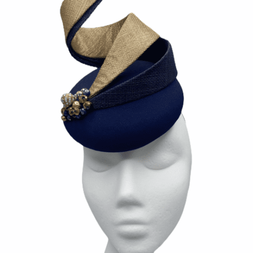 Navy base with gold and navy swirls with gold and navy pearl detail to the base of the swirl.