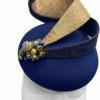 Navy base with gold and navy swirls with gold and navy pearl detail to the base of the swirl.