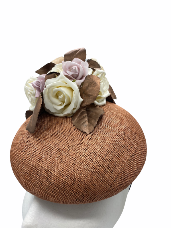Bronze/brown base headpiece with an array of complementary flowers to finish.