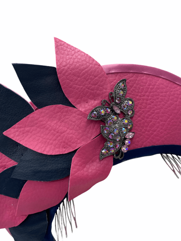 Navy/Pink leather halo crown, finished with pink/navy flowers. Lovely jewel detail to the base of one petal as per photo.