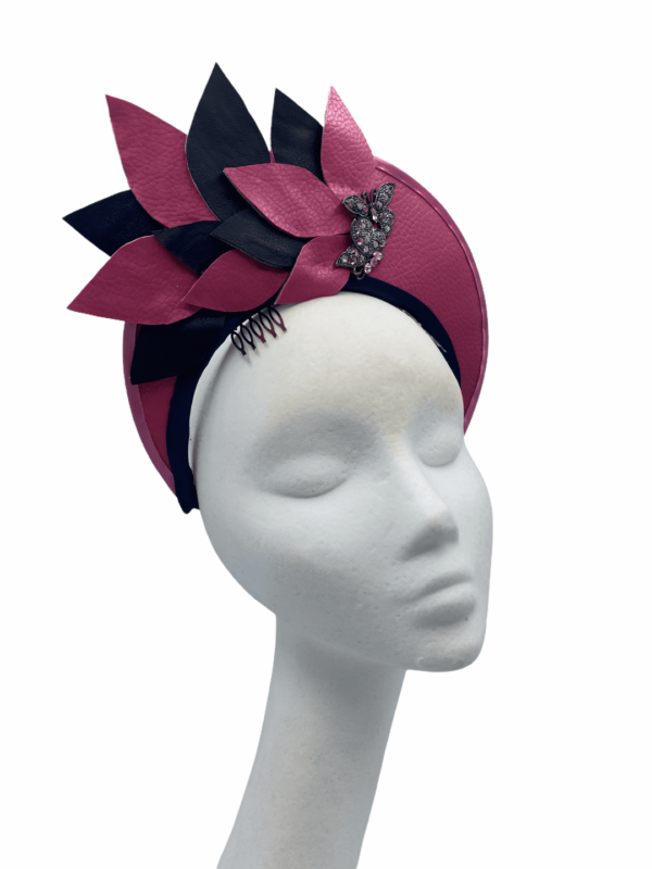 Navy/Pink leather halo crown, finished with pink/navy flowers. Lovely jewel detail to the base of one petal as per photo.