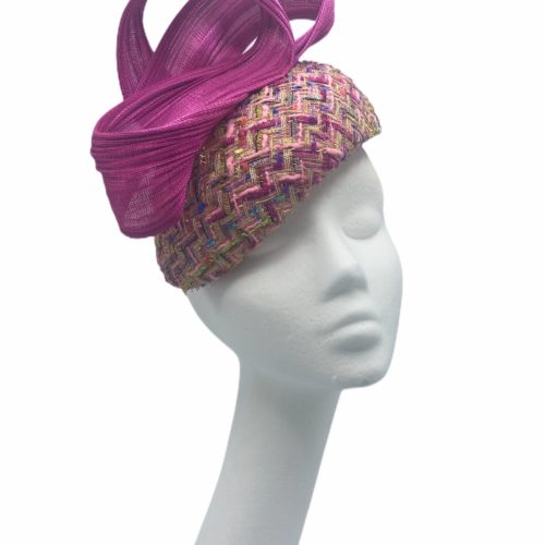 Stunning pink tweed teardrop beret with pink jinsin structure detail to the top to finish.