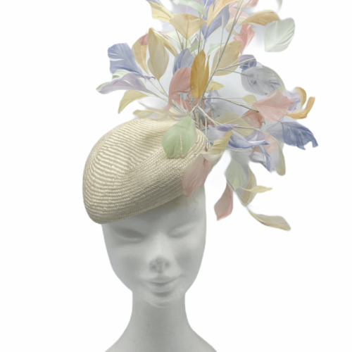 Cream teardrop headpiece with an array of individually hand dyed pastel coloured feathers.