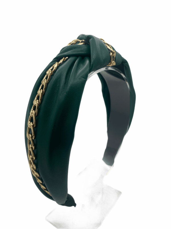 Green faux leather headband with gold chain detail.