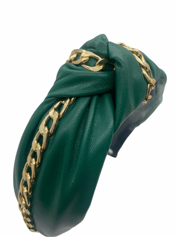 Green faux leather headband with gold chain detail.