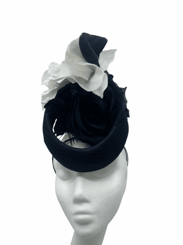 Stunning black percher headpiece with monochrome detail.