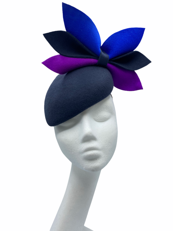Stunning dark grey felt teardrop finished with blue and purple felt pops of colour bows.