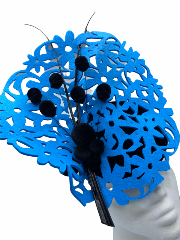 Blue disc laser cut headpiece with black base and black quill detail.