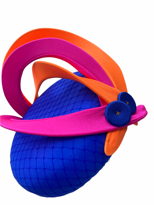 Blue headpiece with stunning pink and orange swirl detail.