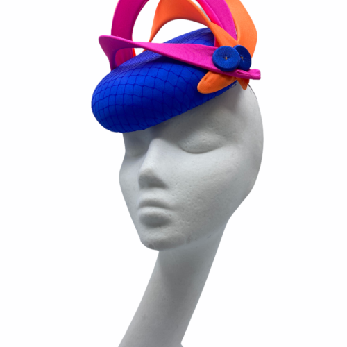 Blue headpiece with stunning pink and orange swirl detail.