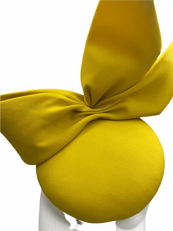 Yellow side bow headpiece, perfect for a busy/patterned outfit.