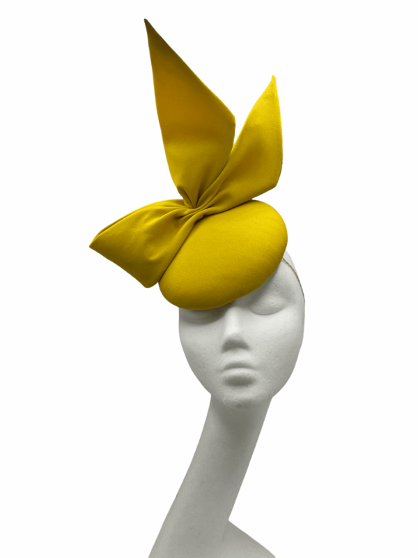 Yellow side bow headpiece, perfect for a busy/patterned outfit.