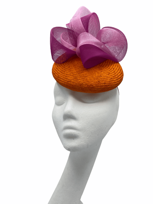 Orange base headpiece with pink and magenta detail.