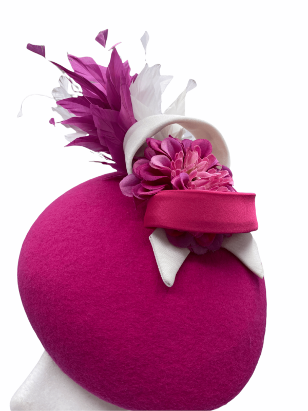 Fuchsia pink felt base teardrop with beautiful detail to the top with ivory swirl.