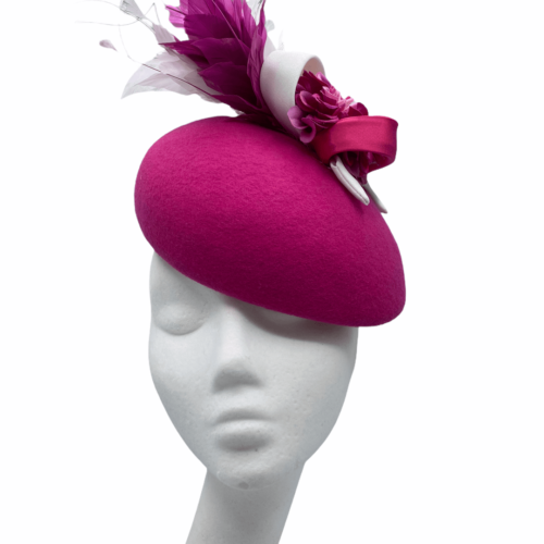 Fuchsia pink felt base teardrop with beautiful detail to the top with ivory swirl.
