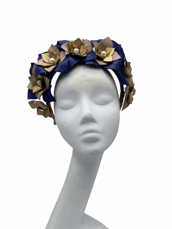 Stunning Navy and gold leather crown with pearl centre.