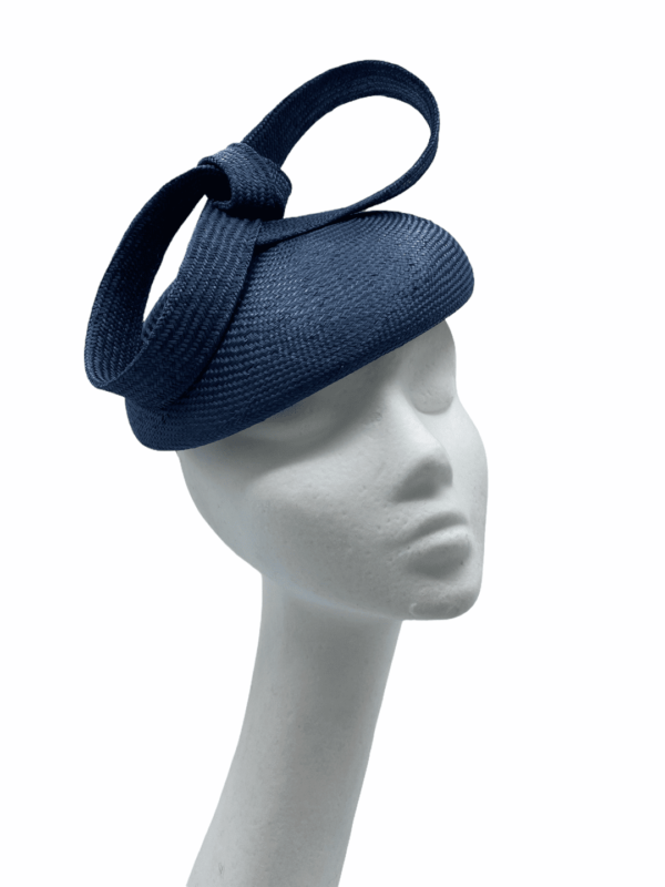 Navy natural parassisal straw headpiece with stunning knotted swirl detail.  