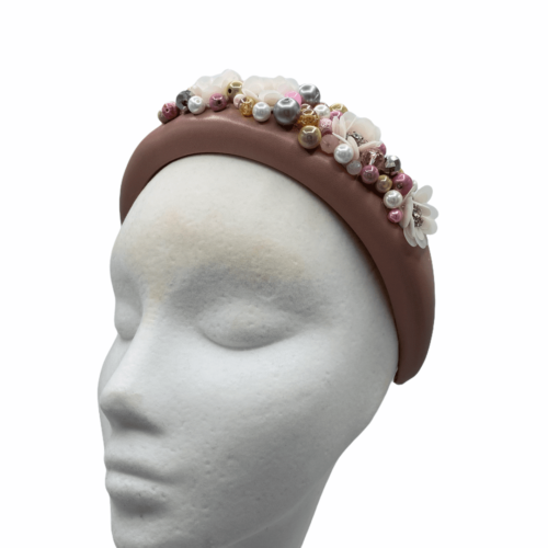 Blush pink leather deep padded millinery made headband with multicoloured bead detail.