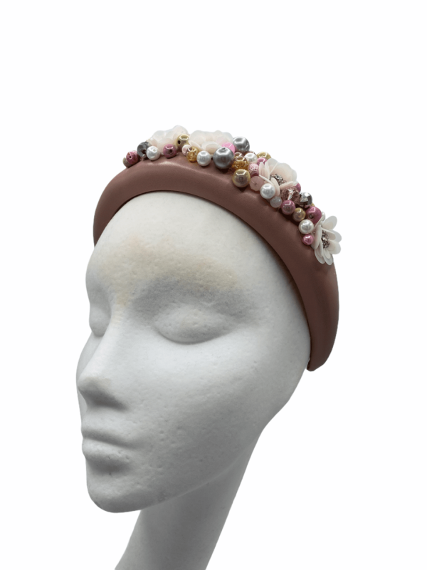 Blush pink leather deep padded millinery made headband with multicoloured bead detail.