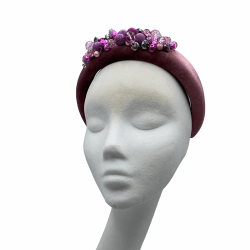 Pink velvet deep padded millinery made headband with beaded detail to the top.