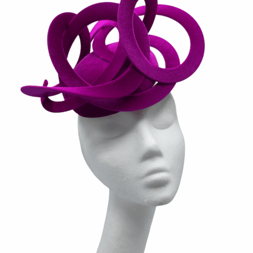 Stunning magenta velvet swirl small/medium sized headpiece.