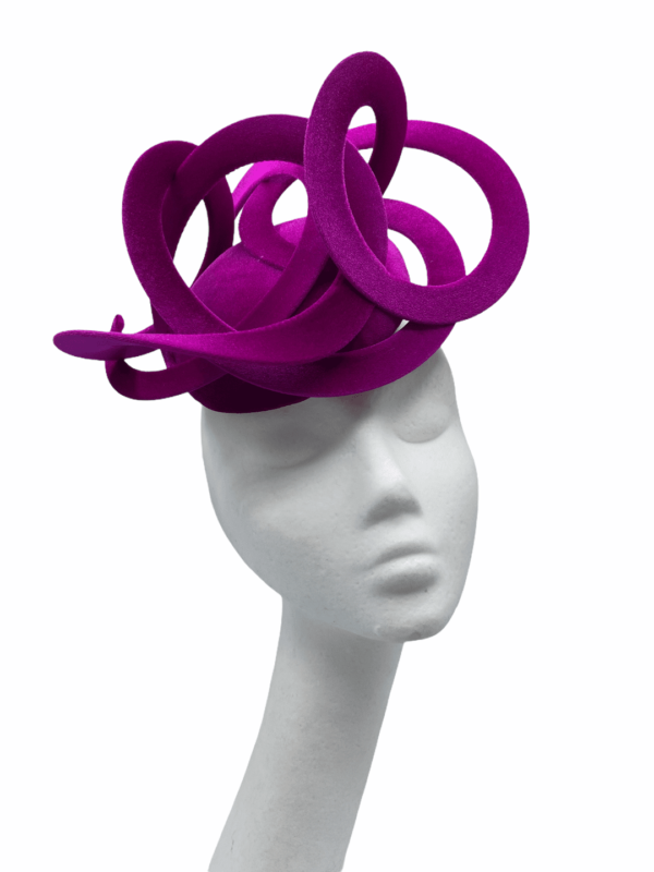 Stunning magenta velvet swirl small/medium sized headpiece.