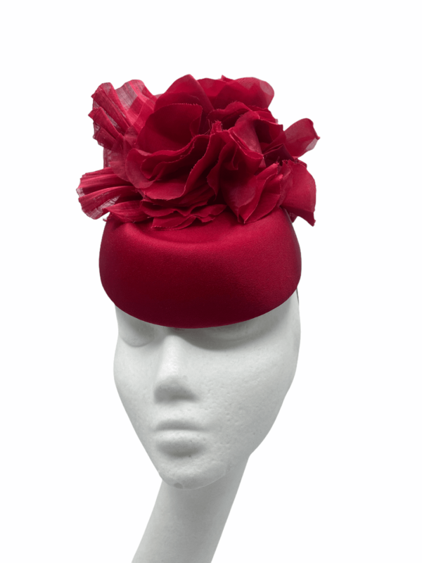 Stunning red headpiece with red silk flowers.