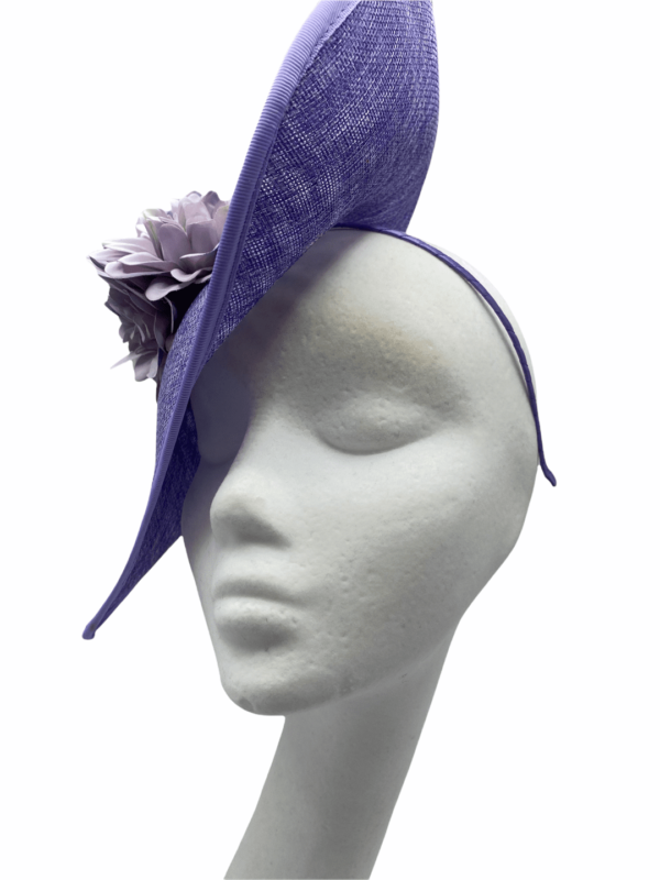 Lilac headpiece on a headband with stunning lilac flower detail.