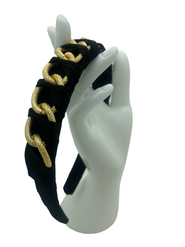 Black headband with intertwining gold chain detail.