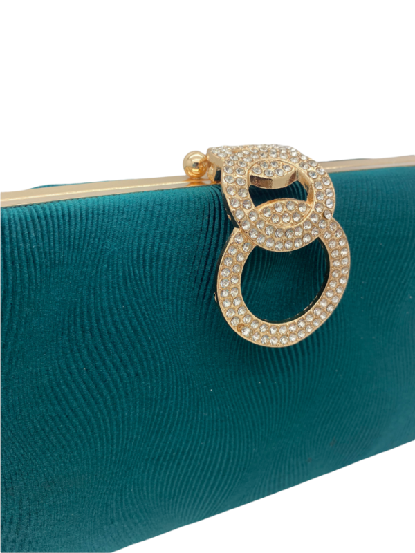 Green clutch bag with gold hardware